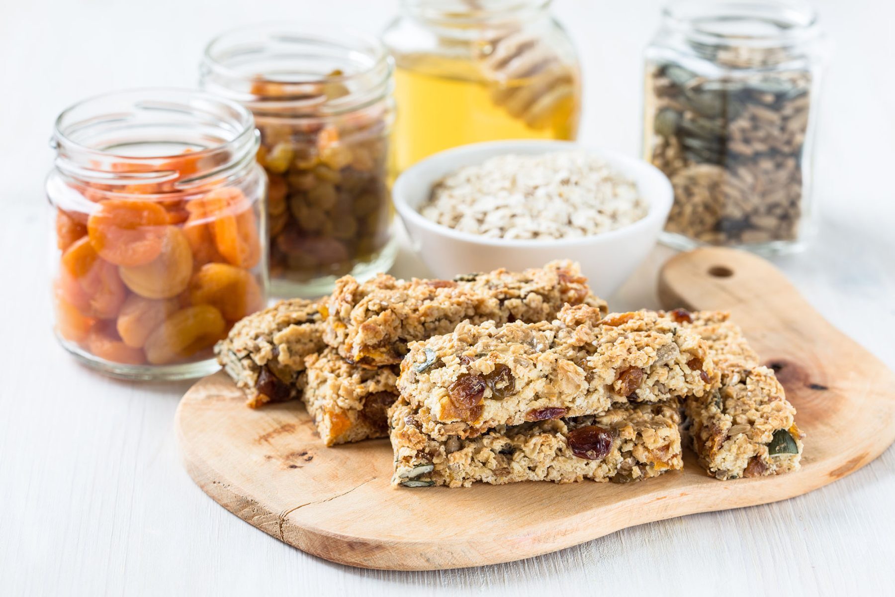 Healthy homemade granola bars and   ingredients  on  background office pantry service and vending service in Calgary